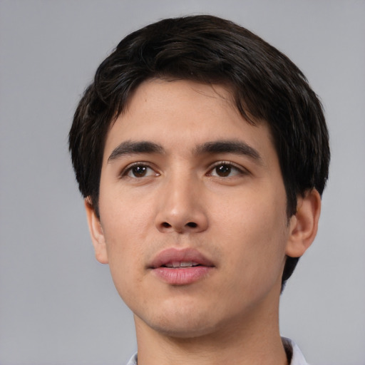 Neutral white young-adult male with short  black hair and brown eyes