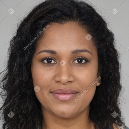 Joyful black young-adult female with long  brown hair and brown eyes