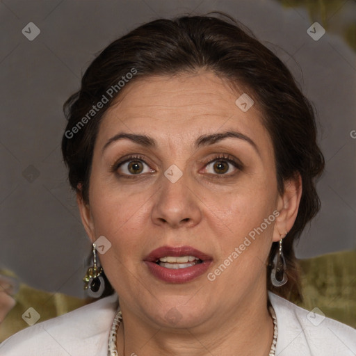 Joyful white adult female with short  brown hair and brown eyes