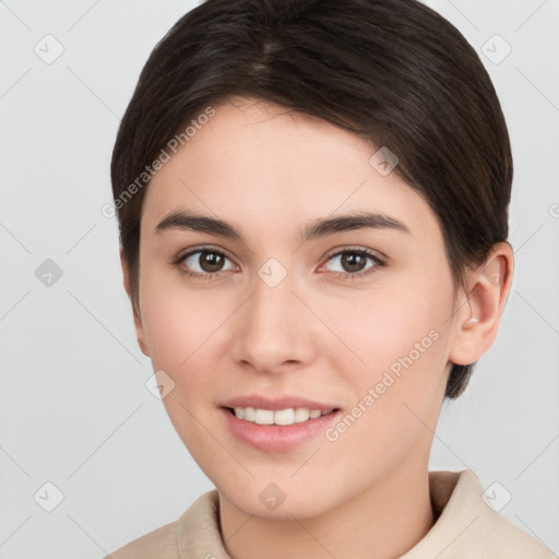 Joyful white young-adult female with short  brown hair and brown eyes