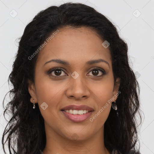 Joyful black young-adult female with long  brown hair and brown eyes