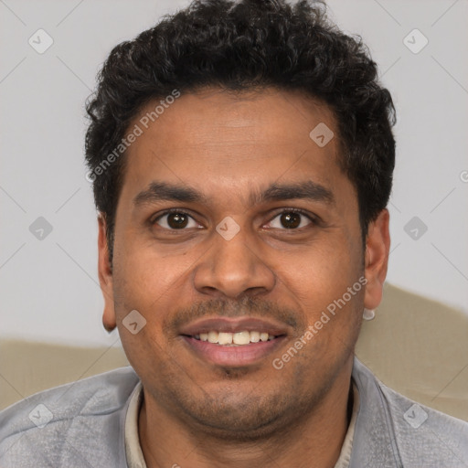 Joyful latino young-adult male with short  brown hair and brown eyes
