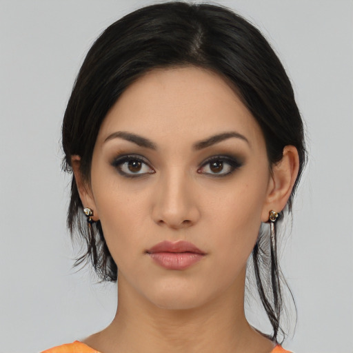 Neutral latino young-adult female with medium  black hair and brown eyes