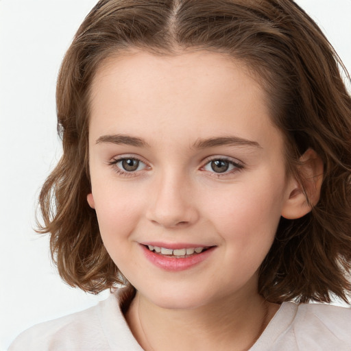 Joyful white child female with medium  brown hair and brown eyes