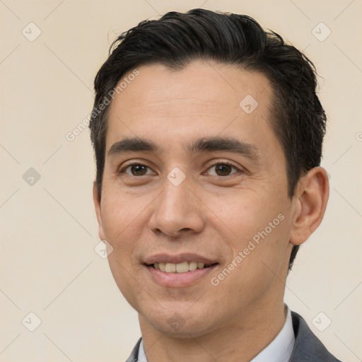 Joyful white young-adult male with short  black hair and brown eyes