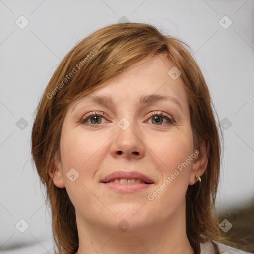 Joyful white young-adult female with medium  brown hair and grey eyes