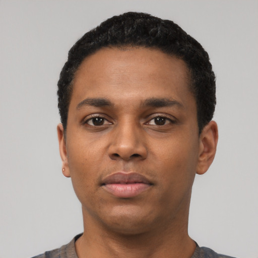 Neutral black young-adult male with short  black hair and brown eyes