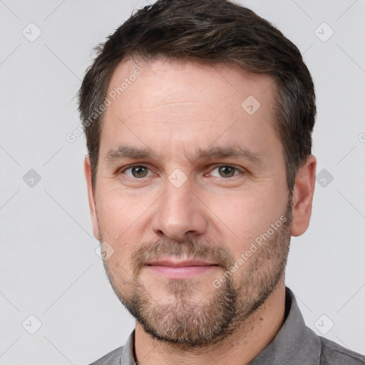 Neutral white adult male with short  brown hair and brown eyes