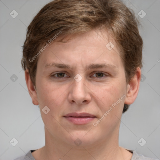 Joyful white adult female with short  brown hair and grey eyes