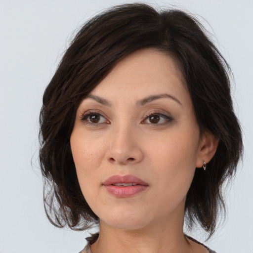 Neutral asian young-adult female with medium  brown hair and brown eyes