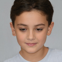 Joyful white child female with short  brown hair and brown eyes