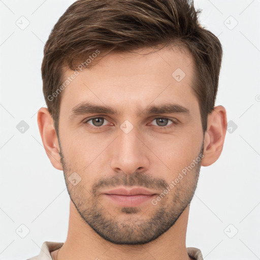 Neutral white young-adult male with short  brown hair and brown eyes