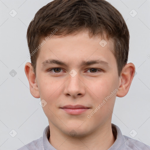 Joyful white child male with short  brown hair and brown eyes