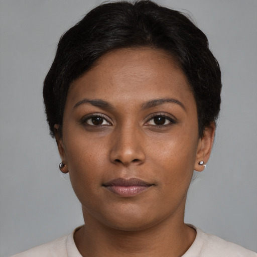 Neutral latino young-adult female with short  brown hair and brown eyes
