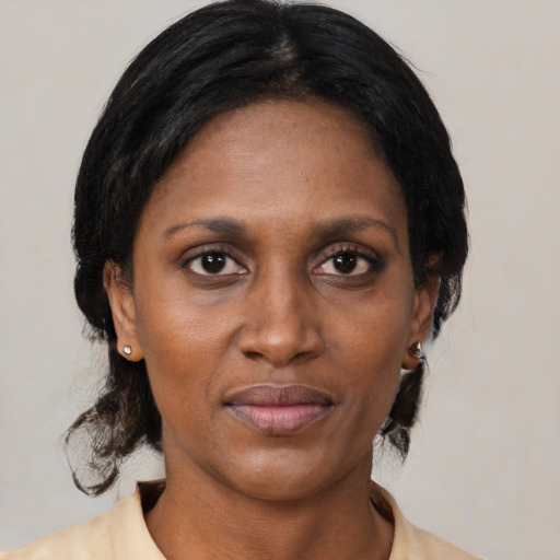 Neutral black adult female with medium  black hair and brown eyes