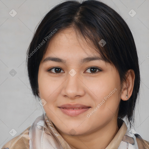 Joyful latino young-adult female with medium  brown hair and brown eyes