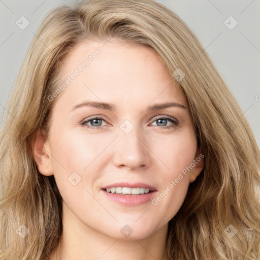 Joyful white young-adult female with long  brown hair and grey eyes