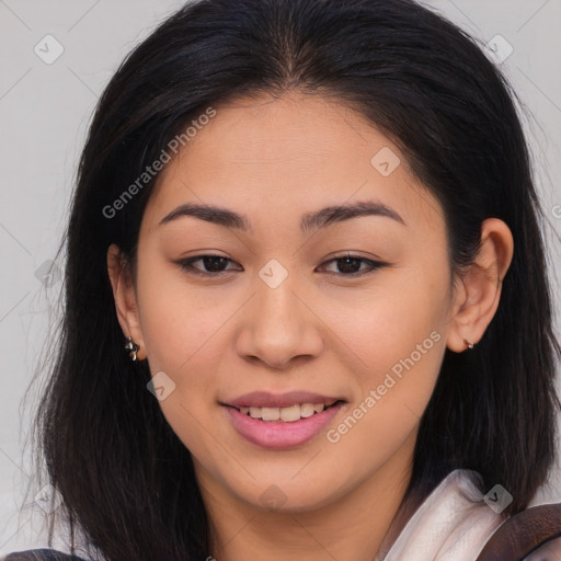 Joyful asian young-adult female with long  brown hair and brown eyes