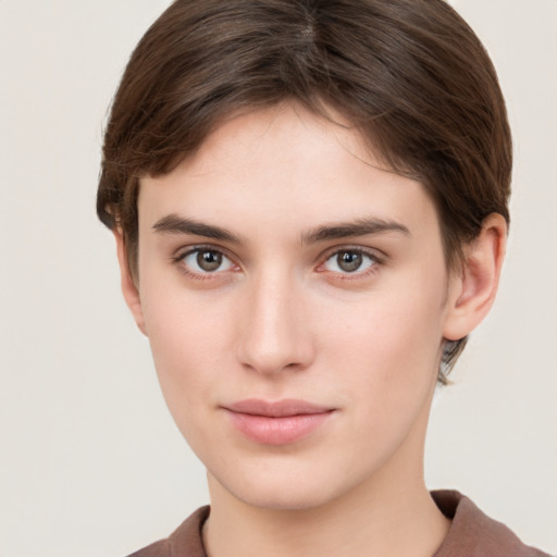 Neutral white young-adult female with short  brown hair and brown eyes