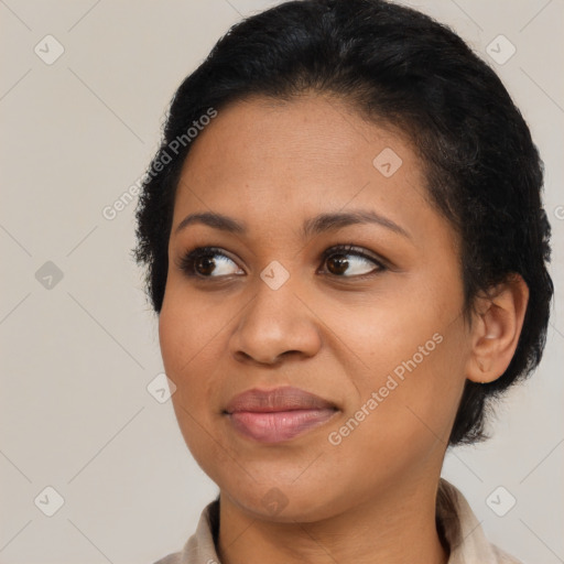 Joyful latino young-adult female with short  brown hair and brown eyes