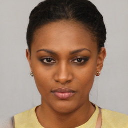 Neutral black young-adult female with short  black hair and brown eyes