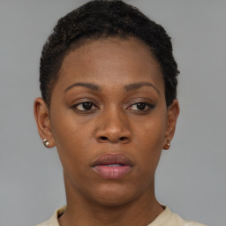 Neutral black young-adult female with short  brown hair and brown eyes