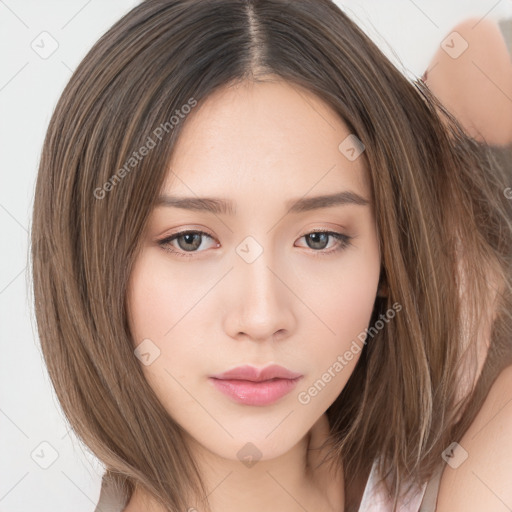 Neutral white young-adult female with long  brown hair and brown eyes