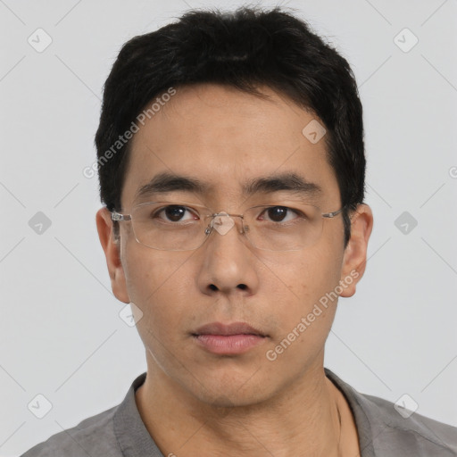 Neutral asian adult male with short  black hair and brown eyes