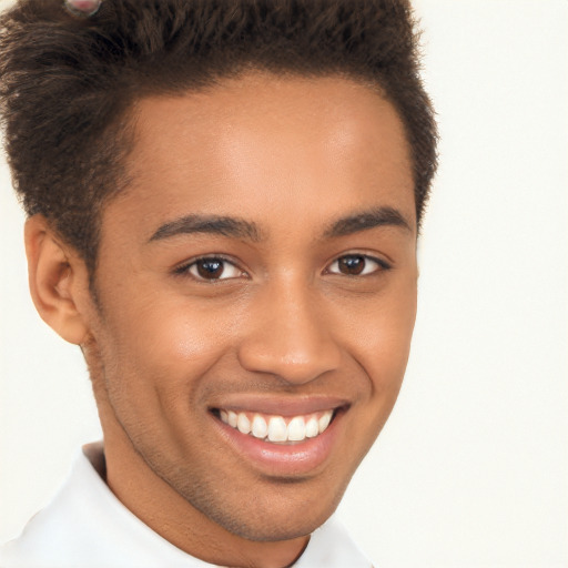 Joyful black young-adult male with short  brown hair and brown eyes