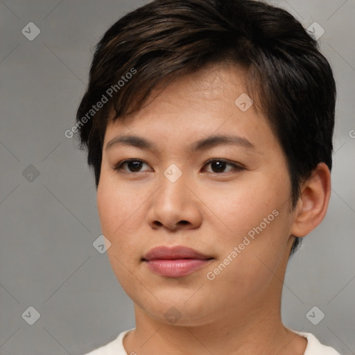 Joyful asian young-adult female with short  brown hair and brown eyes