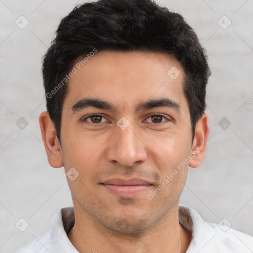 Joyful white young-adult male with short  black hair and brown eyes