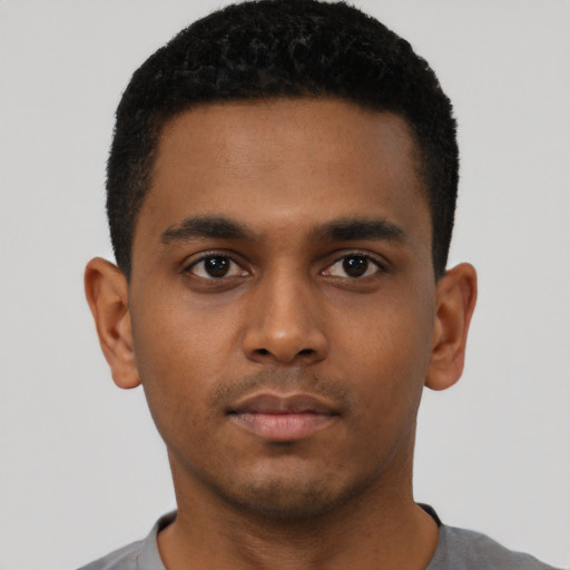 Neutral black young-adult male with short  black hair and brown eyes
