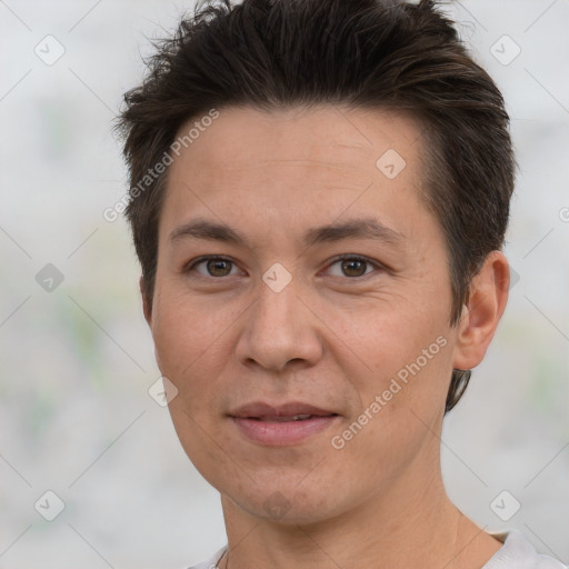 Joyful white adult female with short  brown hair and brown eyes