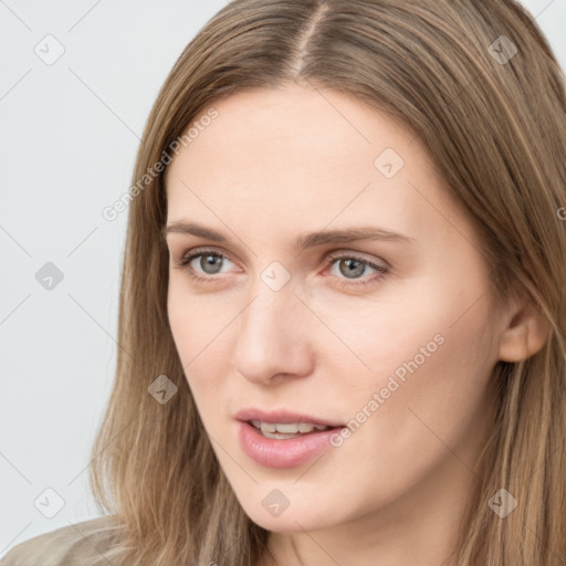 Neutral white young-adult female with long  brown hair and brown eyes