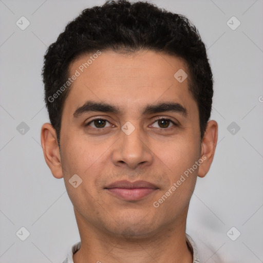 Joyful white young-adult male with short  black hair and brown eyes