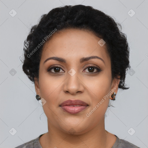 Joyful latino young-adult female with short  brown hair and brown eyes