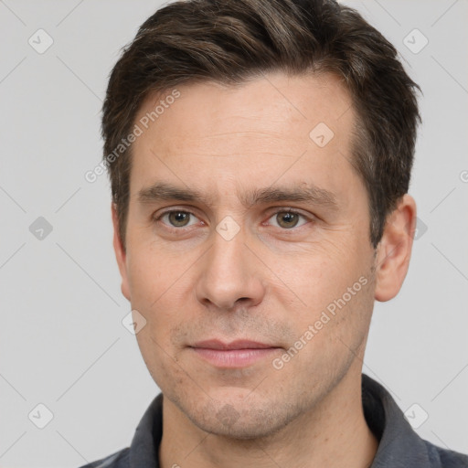 Neutral white adult male with short  brown hair and brown eyes