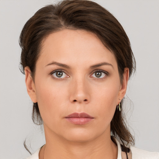 Neutral white young-adult female with medium  brown hair and brown eyes