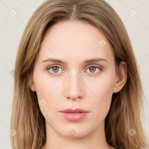 Neutral white young-adult female with long  brown hair and green eyes