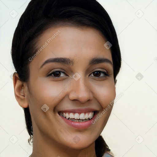 Joyful white young-adult female with long  brown hair and brown eyes