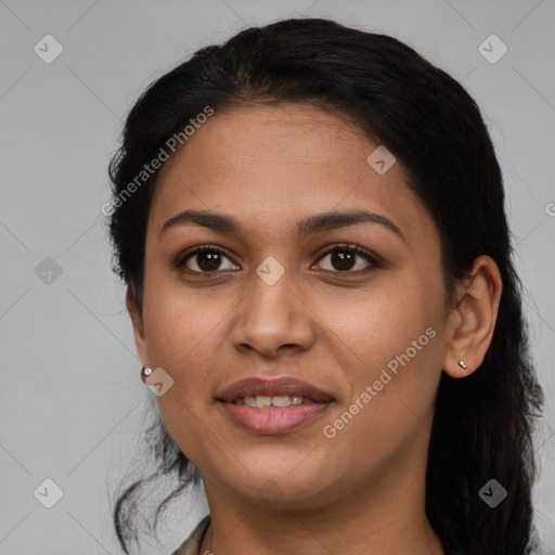 Joyful latino young-adult female with long  brown hair and brown eyes