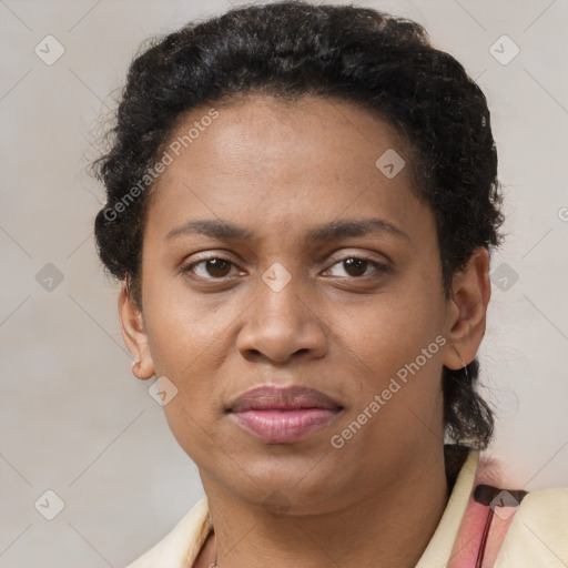 Joyful latino adult female with short  brown hair and brown eyes