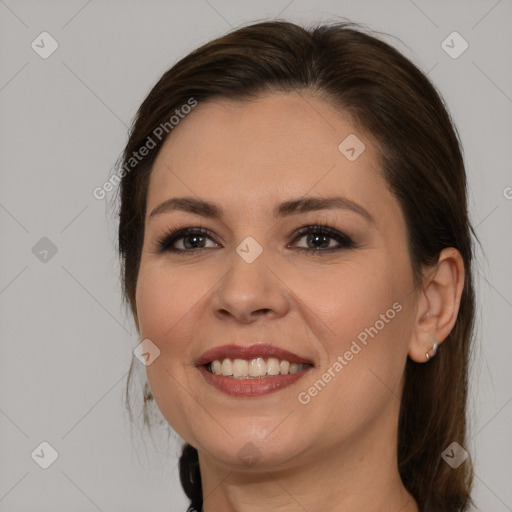 Joyful white young-adult female with medium  brown hair and brown eyes