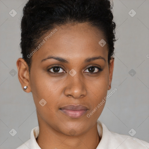 Joyful black young-adult female with short  brown hair and brown eyes