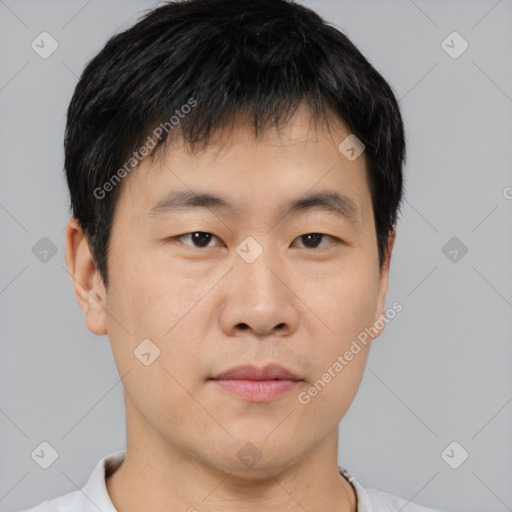 Neutral asian young-adult male with short  brown hair and brown eyes