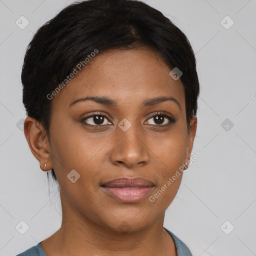 Joyful black young-adult female with short  brown hair and brown eyes