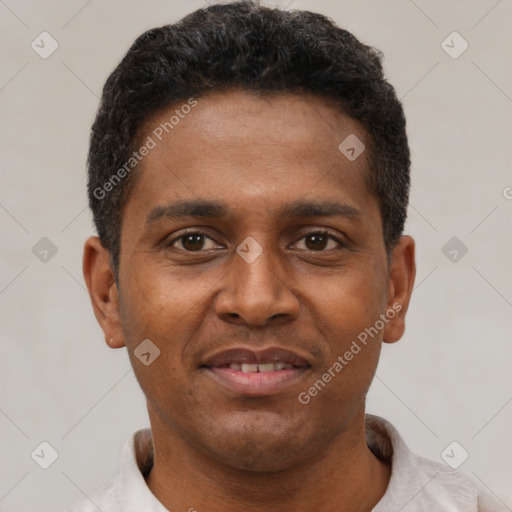 Joyful latino young-adult male with short  brown hair and brown eyes