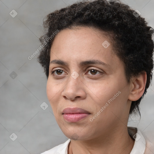 Joyful white adult female with short  brown hair and brown eyes