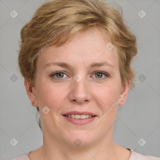 Joyful white adult female with medium  brown hair and blue eyes