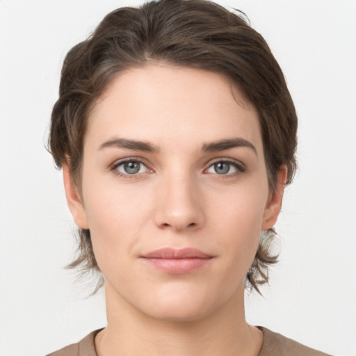 Neutral white young-adult female with medium  brown hair and brown eyes